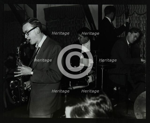 The John Cox Trio and Derek Humble playing at the Civic Restaurant, Bristol, 1955.  Artist: Denis Williams