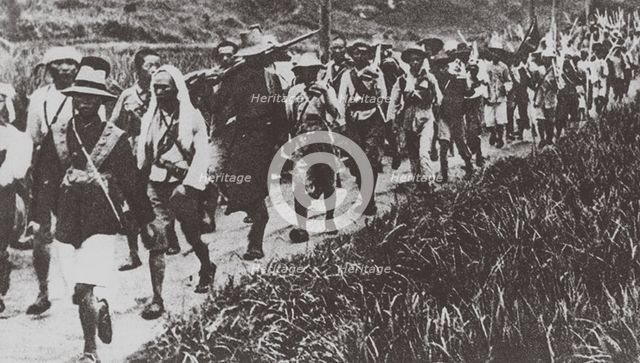 The Kuomintang troops captured Beijing in June 1928 Artist: Anonymous  