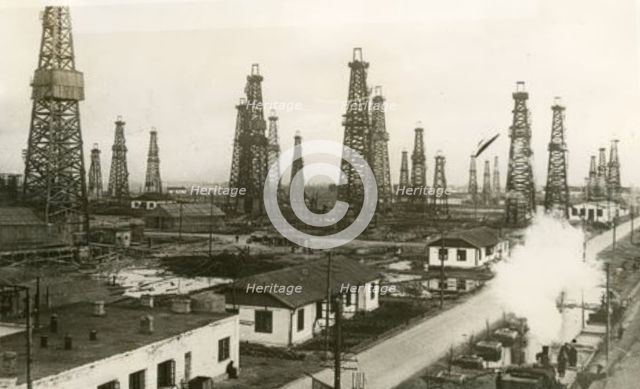 The Kaganovich oilfield outside Baku, 1940. Creators: Air Ministry, Royal Air Force.