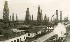 The Kaganovich oilfield outside Baku, 1940. Creators: Air Ministry, Royal Air Force