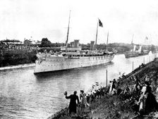 The Kaiser's Yacht, the "Hohenzollern," leading the procession through the Canal, 1895. Creator: George Meisenbach