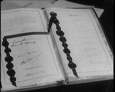 The Kellogg Briand Pact Book with Signatures, 1929. Creator: British Pathe Ltd