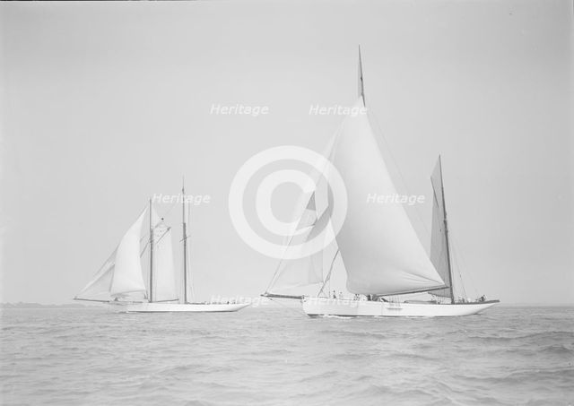 The ketch 'Cariad' and schooner 'Irma' racing downwind, 1911. Creator: Kirk & Sons of Cowes.