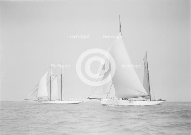 The ketch 'Cariad' and schooner 'Irma' racing downwind, 1911. Creator: Kirk & Sons of Cowes.