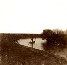 The Kherlen River - Soldiers in a boat, 1899. Creator: Unknown