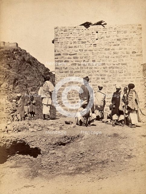 The Khyber Pass, Pakistan: men in a group with rifles, c1900. Creator: Unknown.