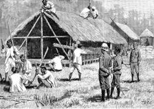 The Lushai Expedition: Goorkhas building a hut to store their spare kit, 1890. Creator: R. Taylor