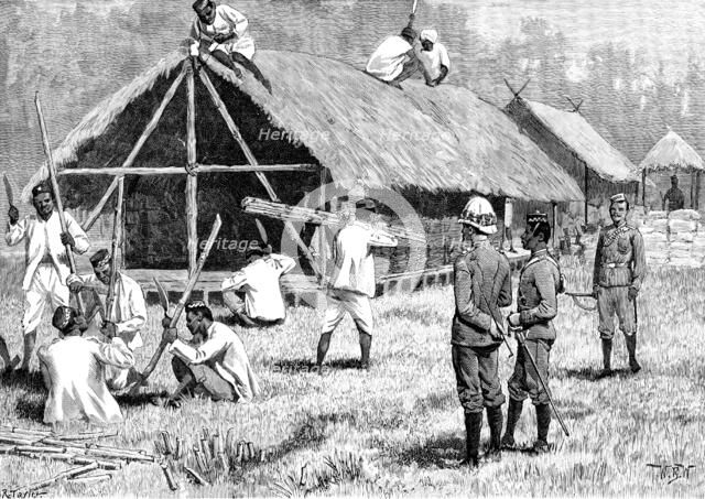 The Lushai Expedition: Goorkhas building a hut to store their spare kit, 1890. Creator: R. Taylor.