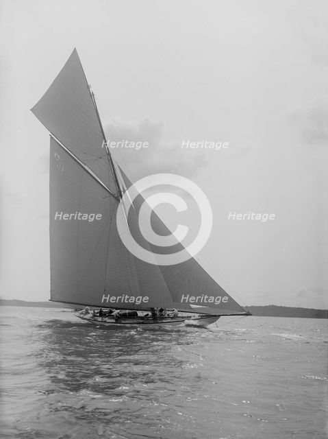 'The Lady Anne' 15 Metre class cutter sails upwind, 1912. Creator: Kirk & Sons of Cowes.