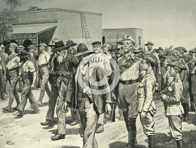 'The Last Attack on Mafeking: B.S.A. Police Escorting Boer Prisoners to the Gaol', 1901. Creator: Henry Marriott Paget.