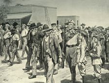 The Last Attack on Mafeking: B.S.A. Police Escorting Boer Prisoners to the Gaol 1901. Creator: Henry Marriott Paget