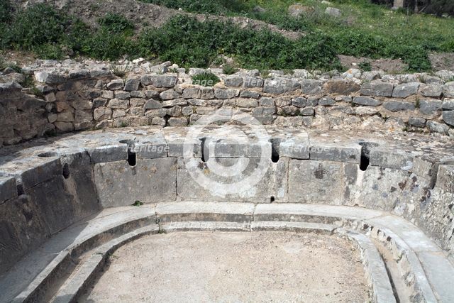 The latrine at the Baths of the Cyclopes, Dougga (Thugga), Tunisia. Creator: Samuel Magal.