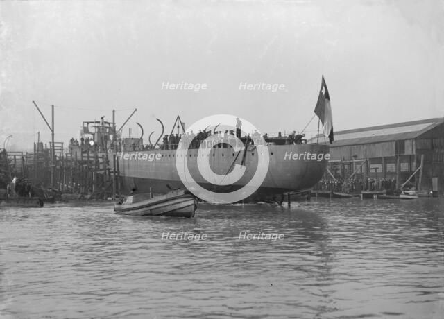 The launch of 'Almirante Simpson' at J. Samuel White shipyard, Cowes, 26th February 1914. Creator: Kirk & Sons of Cowes.