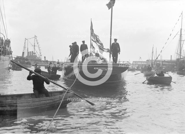 The launch of 'Shamrock IV' at Gosport, May 1914. Creator: Kirk & Sons of Cowes.