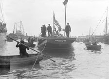 The launch of Shamrock IV at Gosport, May 1914. Creator: Kirk & Sons of Cowes