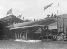 The launch of Shamrock IV at Gosport, May 1914. Creator: Kirk & Sons of Cowes
