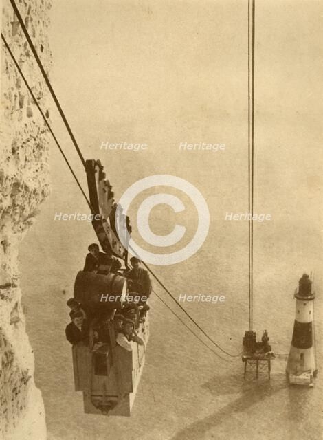 'The Lighthouse Builders', c1930. Creator: J. Weston & Son.