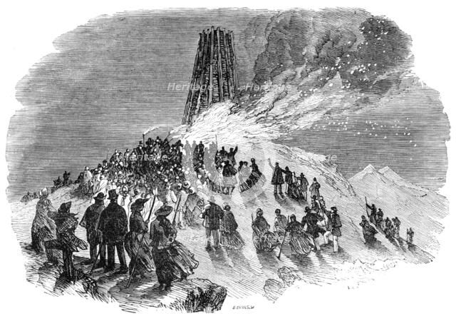 The lighting of the Malvern Monster Beacon, 1856.  Creator: Edmund Evans.