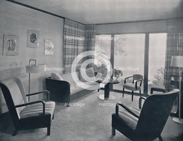 'The living-room of a house designed by Howard T. Fisher for Miss Ruth Page', 1935. Artist: Kaufman & Fabry Co.