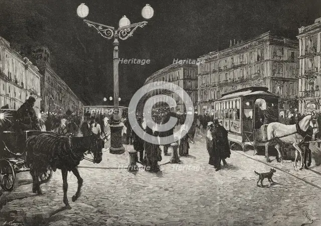 The Puerta del Sol (Gate of the Sun) illuminated by electric light, Madrid, Spain, 1878. Creators: Arturo Carretero y Sánchez, Josep Lluís Pellicer Feñé.