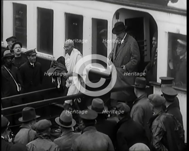 The Party of Mohandas K Gandhi (Mahatma) disembarks in London..., 1931. Creator: British Pathe Ltd.