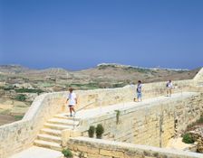 The path around the walls of the citadel, Victoria, Gozo, Malta. Creator: Peter Thompson