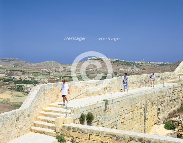 The path around the walls of the citadel, Victoria, Gozo, Malta. Creator: Peter Thompson.