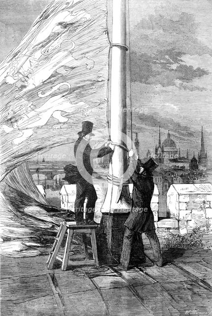 The Peace Rejoicings - Hoisting the Royal Standard at the Tower of London, 1856.  Creator: W Thomas.