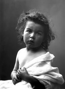 The photographer's little girl posing in his studio, Landskrona, Sweden, 1910. Creator: Unknown