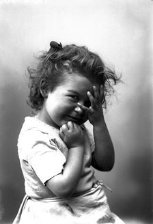 The photographer's little girl posing in his studio, Landskrona, Sweden, 1910