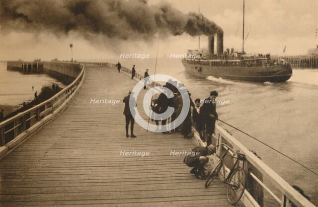 'The Pier and the entrance of the Mail-Steamer',  c1928. Artist: Unknown.