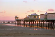 The pier at Lytham St Anne's viewed at sunset, Lancashire, 1999. Artist: P Williams