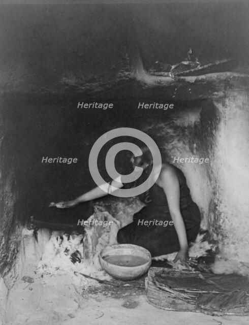 The piki maker-Hopi, c1906. Creator: Edward Sheriff Curtis.
