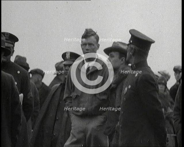 The Pilot Charles Augustus Lindbergh Speaking To Colleagues, 1920s. Creator: British Pathe Ltd.