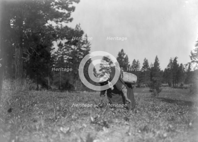The piyake gatherer, c1910. Creator: Edward Sheriff Curtis.