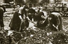The poor of Berlin rummaging in refuse heaps, Germany, c1914-c1918. Creator: Unknown