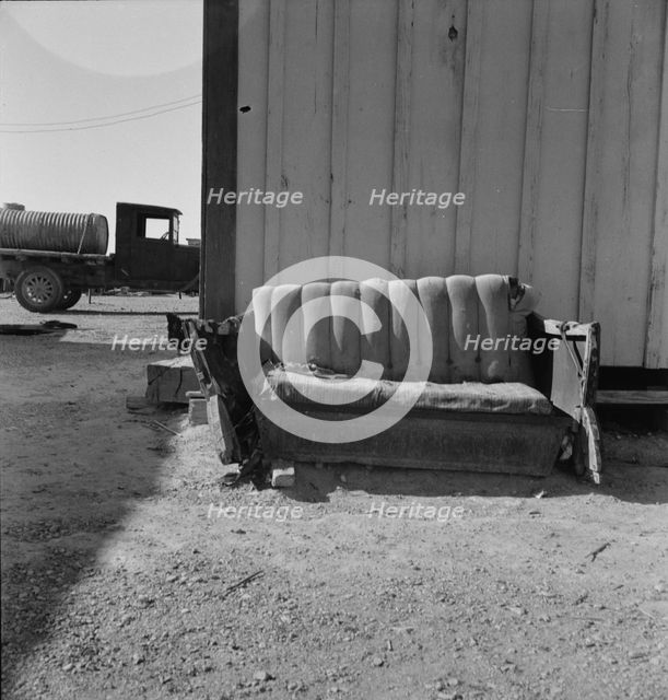 The postmaster's seat, Finlay, Texas, 1937. Creator: Dorothea Lange.