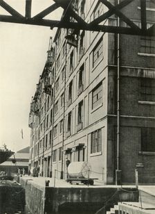 "The Port Prepares To Receive No Longer The Freights of Europe Only, But The Laden... 1937. Creator: Unknown