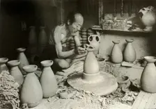 The Potter at his Wheel 1910. Creator: Herbert Ponting