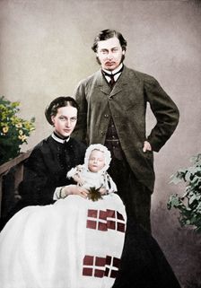 The Prince and Princess of Wales with the infant Prince Albert Victor, 1864 (1910). Creator: Vernon Heath