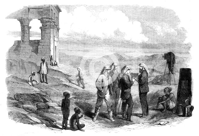 The Prince of Wales' Visit to Egypt: His Royal Highness examining the negatives taken by..., 1862. Creator: Unknown.