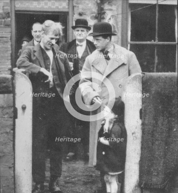The Prince of Wales visiting a miner's cottage in the Northeast of England, 1929 (1936). Artist: Unknown.