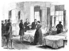 The Prince of Wales visiting persons at St. Bart's Hospital wounded by Clerkenwell Explosion, 1868. Creator: Unknown