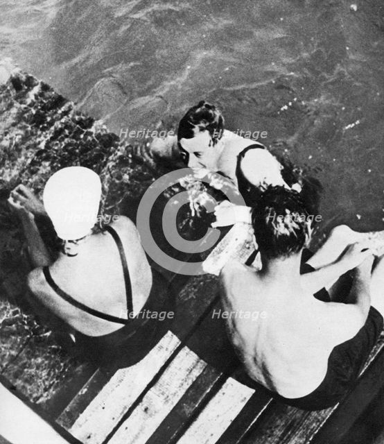 The Prince of Wales with friends on a raft, the Riviera, c1930s. Artist: Unknown
