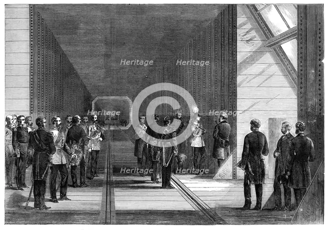The Prince of Wales closing the last rivet of the Victoria Tubular Bridge over the St. Lawrence...,  Creator: Unknown.