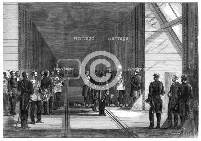 The Prince of Wales closing the last rivet of the Victoria Tubular Bridge over the St. Lawrence...,  Creator: Unknown.