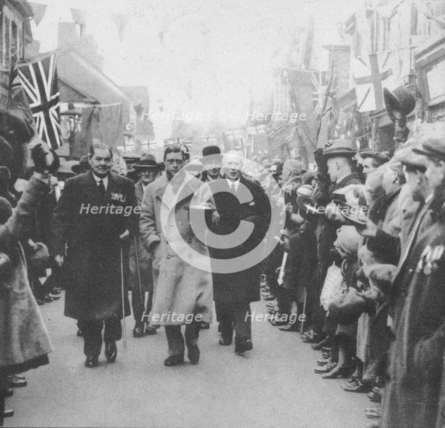 The Prince of Wales greeted by the people of Porth, Glamorgan, during a visit to Wales, 1932 (1936). Artist: Unknown.