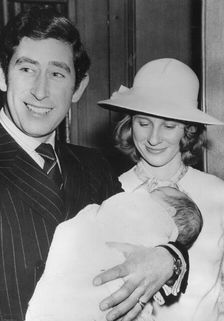 The Prince of Wales holding his godchild, Alexander Windsor, Earl of Ulster, February 1975. Creator: Unknown