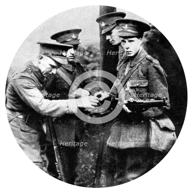 The Prince of Wales loading a rifle in the Grenadiers, First World War, 1914. Artist: Unknown