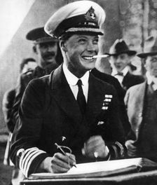The Prince of Wales signing a visitors book in Canada, c1920s